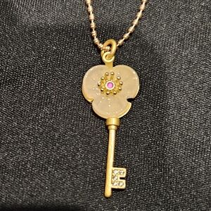Chic Gold Key Necklace with Pink Floral Accent